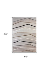 5' X 8' Gray Brown and Beige Abstract Area Rug