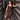 Front view of leopard lace-trim jumpsuit on model