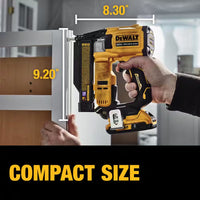 Kit contents laid out: nailer, battery, charger