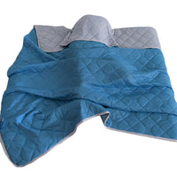 Portable blanket rolled for travel