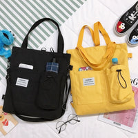 Pockets Preppy” Canvas Backpack – Multi-Pocketed, Durable College Rucksack