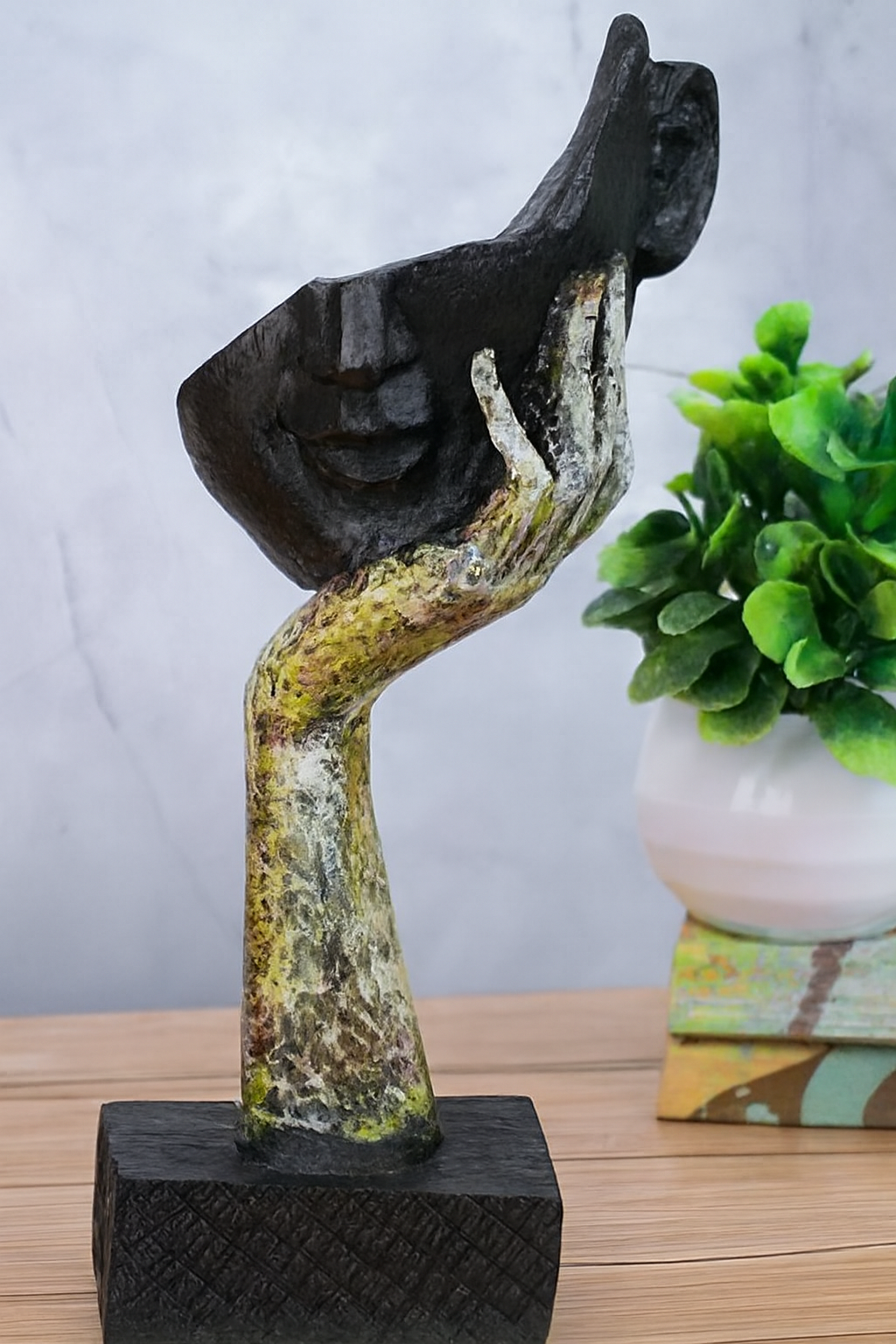Artistic Hand Holding Face Sculpture – Abstract Resin Decor